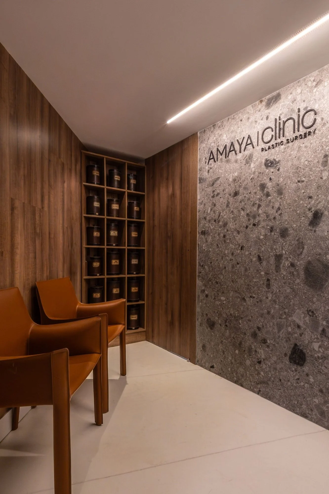 Amaya Hair Clinic waiting area with modern wood paneling
