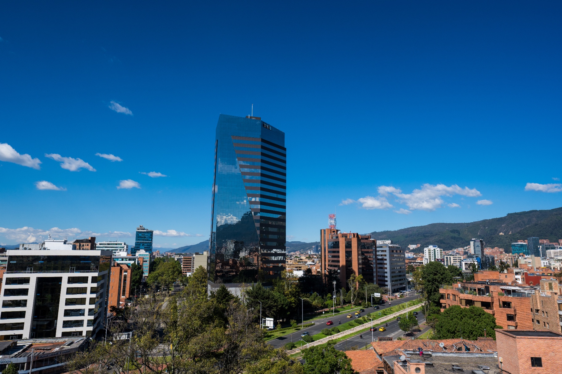 Bogota business district skyline with Medical Tower landmark Panoramic view of Bogota's medical district skyline under blue sky